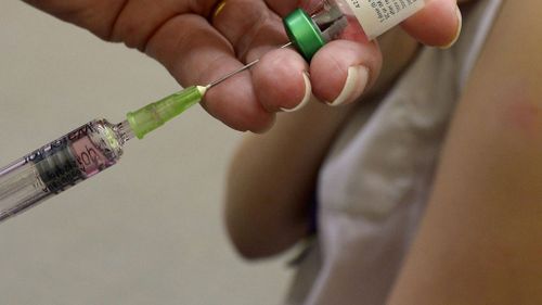 Low flu vaccination rates across Australia have experts concerned.