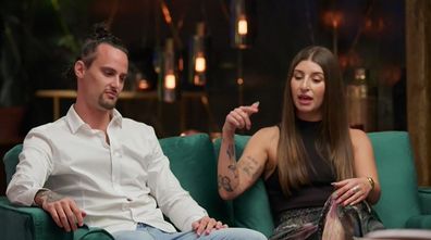Claire and Jesse on the couch at Commitment Ceremony Season 10 MAFS 2023