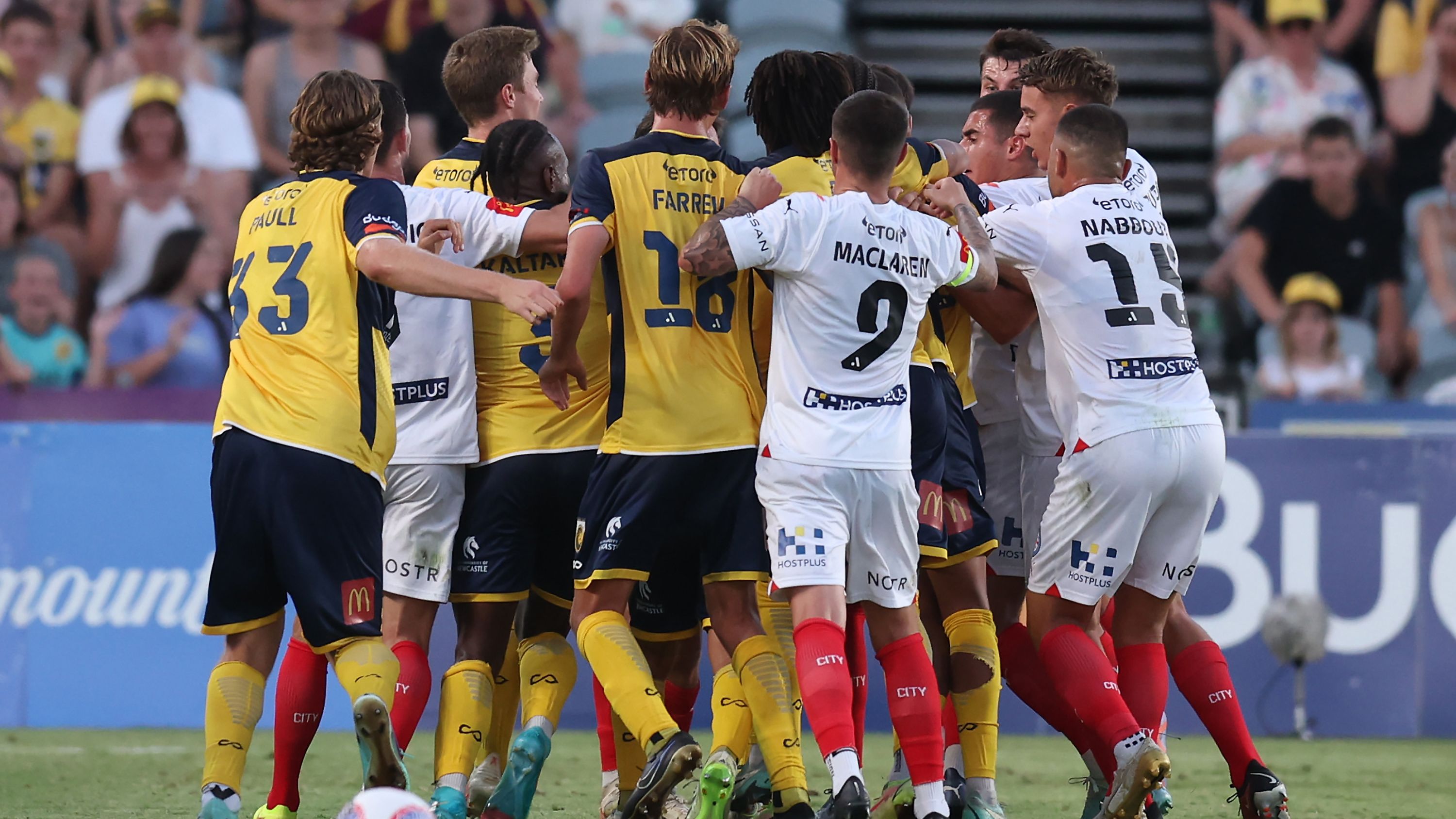 Players tussle during the A-League match between Central Coast Mariners and Melbourne City.