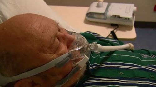 David Cahoon with a CPAP machine. (9NEWS)