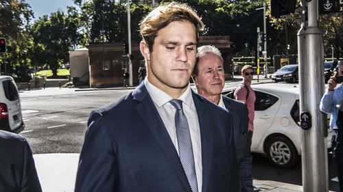 Jack de Belin arrives at Downing Centre Local & District Court in Sydney.