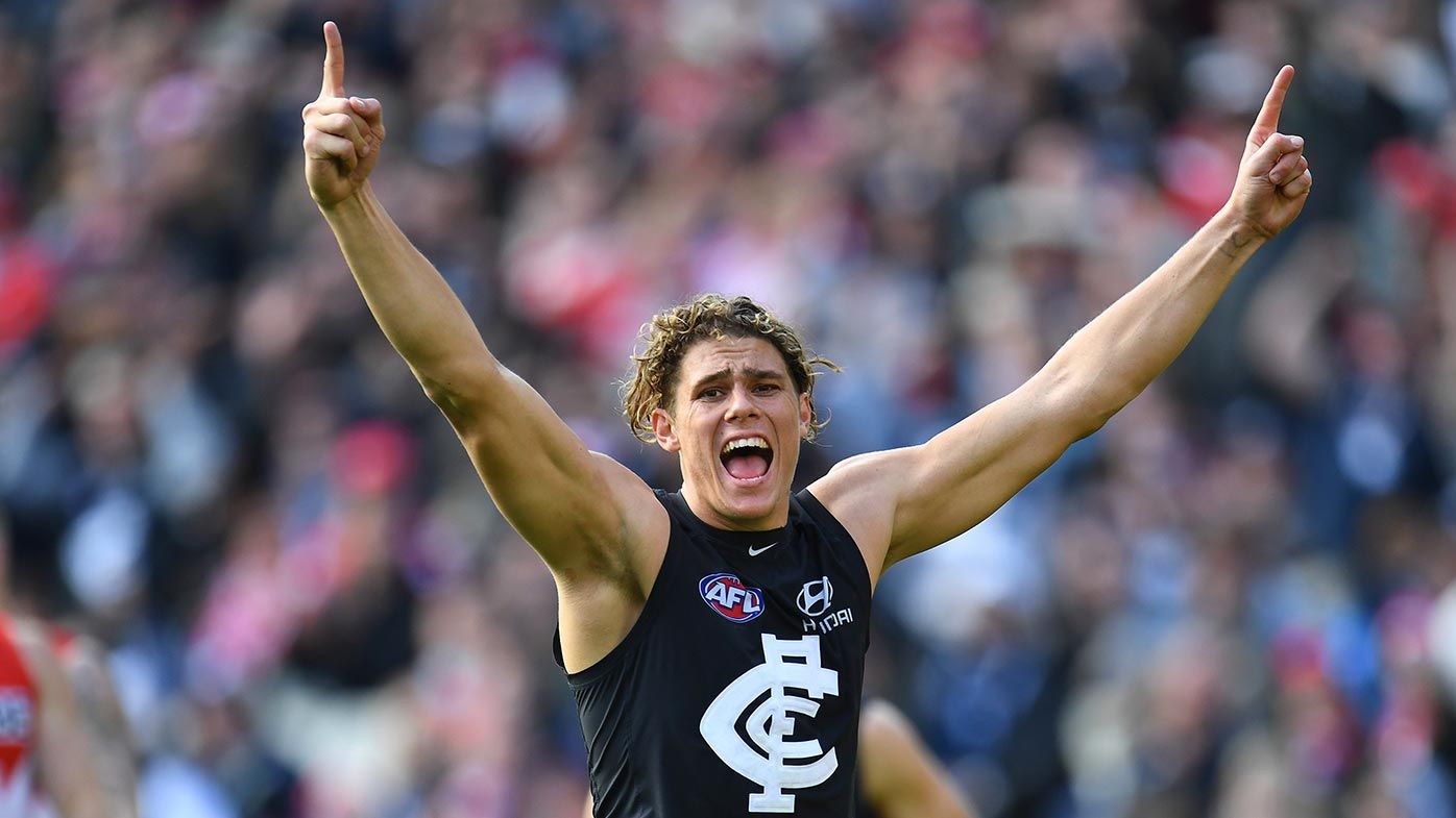 Charlie Curnow of the Blues reacts after kicking a goal