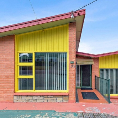 Retro Tassie home has a 'downstairs den for the man with too many toys'