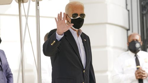 President Joe Biden walks out of the White House to board Marine One at the White House in Washington, Friday, Feb. 26, 2021, for a short trip to Andrews Air Force Base, Md., and then on to Houston