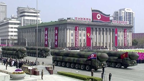 Missiles are displayed during a parade at Kim Il-Sung Square.