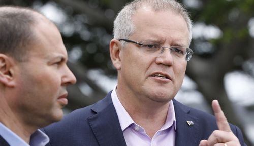 Federal Treasurer Josh Frydenberg (left) and Prime Minister Scott Morrison have something to smile about.