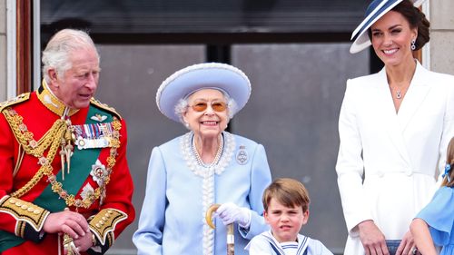 (L-R) Prince Charles, Prince of Wales, Queen Elizabeth II, Prince Louis of Cambridge as Catherine, Duchess of Cambridge and Princess Charlotte of Cambridge on the balcony of Buckingham Palace during the Trooping the Colour parade on June 02, 2022 in London, England. 