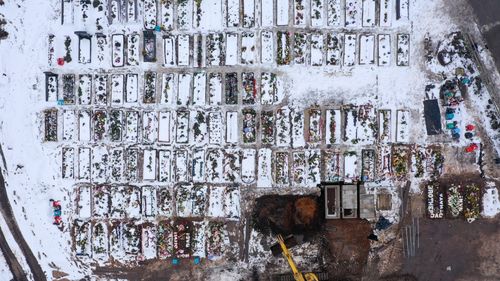 An aerial view of recent burial chambers at Sutton New Hall Cemetery in Sutton Coldfield, England. UK government figures indicate that people who have died with coronavirus in the UK has exceeded 100,000