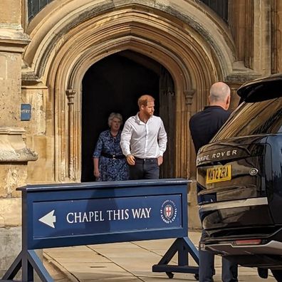 Prince Harry leaving St George's Chapel in Windsor after paying respects to Queen Elizabeth II on her first death anniversary
