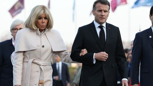 French President Emmanuel Macron and his wife Brigitte Macron