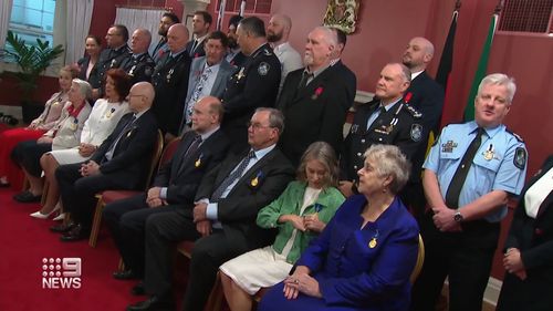 Queensland man receives bravery award for thwarting armed robbery using a pot plant