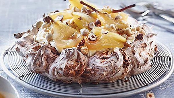Chocolate pavlova with hazelnuts and pears