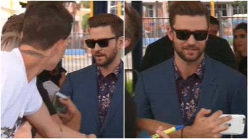 Timberlake treated fans to plenty of autographs and 'selfies'. (9NEWS)