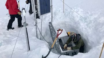 Matt servicing a GPS station logger and battery box while Chloe and Meghan start taking down the solar panels before me moved the box and poles to a new spot nearby. Photos provided to Katie Hunt by Kerry Key, Columbia University. Permission for CNN to use across all platforms/distribute to affils.