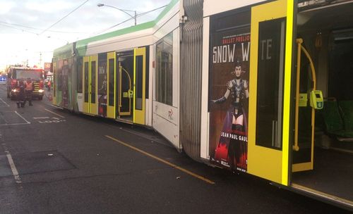 The tram was knocked off the tracks in the crash. Picture: Madeline Slattery