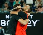 MELBOURNE, AUSTRALIA - JANUARY 29: Nick Kyrgios (R) of Australia and Thanasi Kokkinakis of Australia celebrate match point in their Men&#x27;s Doubles Final match against Matthew Ebden of Australia and Max Purcell of Australia during day 13 of the 2022 Australian Open at Melbourne Park on January 29, 2022 in Melbourne, Australia. (Photo by Darrian Traynor/Getty Images)