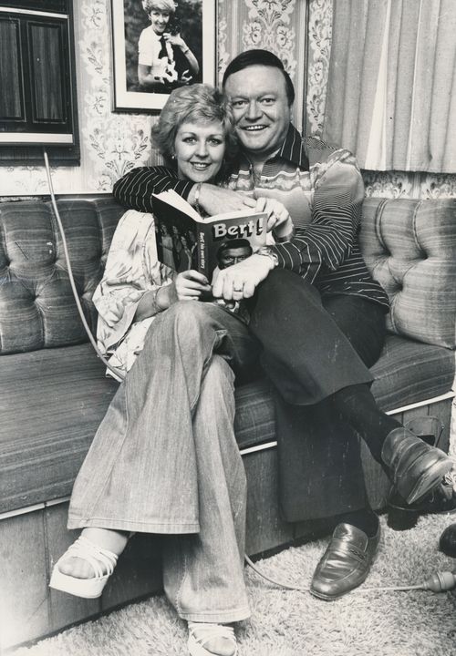 Bert and Patti Newton at home with a copy of his book, 'Bert!  : Bert Newton's own story in 1977.