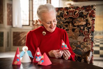 Queen Margrethe of Denmark with Christmas goblins for the digital advent calendar