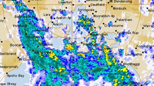 The band of showers moved across Melbourne this morning. 