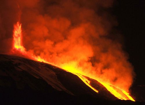 A spectacular night-time photo of Mount Etna exploding last year. 