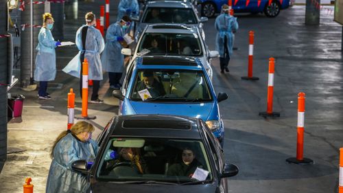 A general view of a drive through Covid-19 testing site at a shopping centre carpark in a hotspot suburb on July 04, 2020 in Melbourne, Australia. 