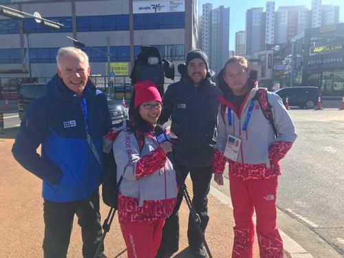 Theresia Citra and Myles Smith with 9NEWS reporter Damian Ryan. (9NEWS)