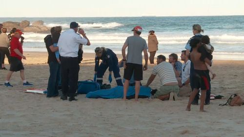 Rescuers on the beach. (9NEWS)