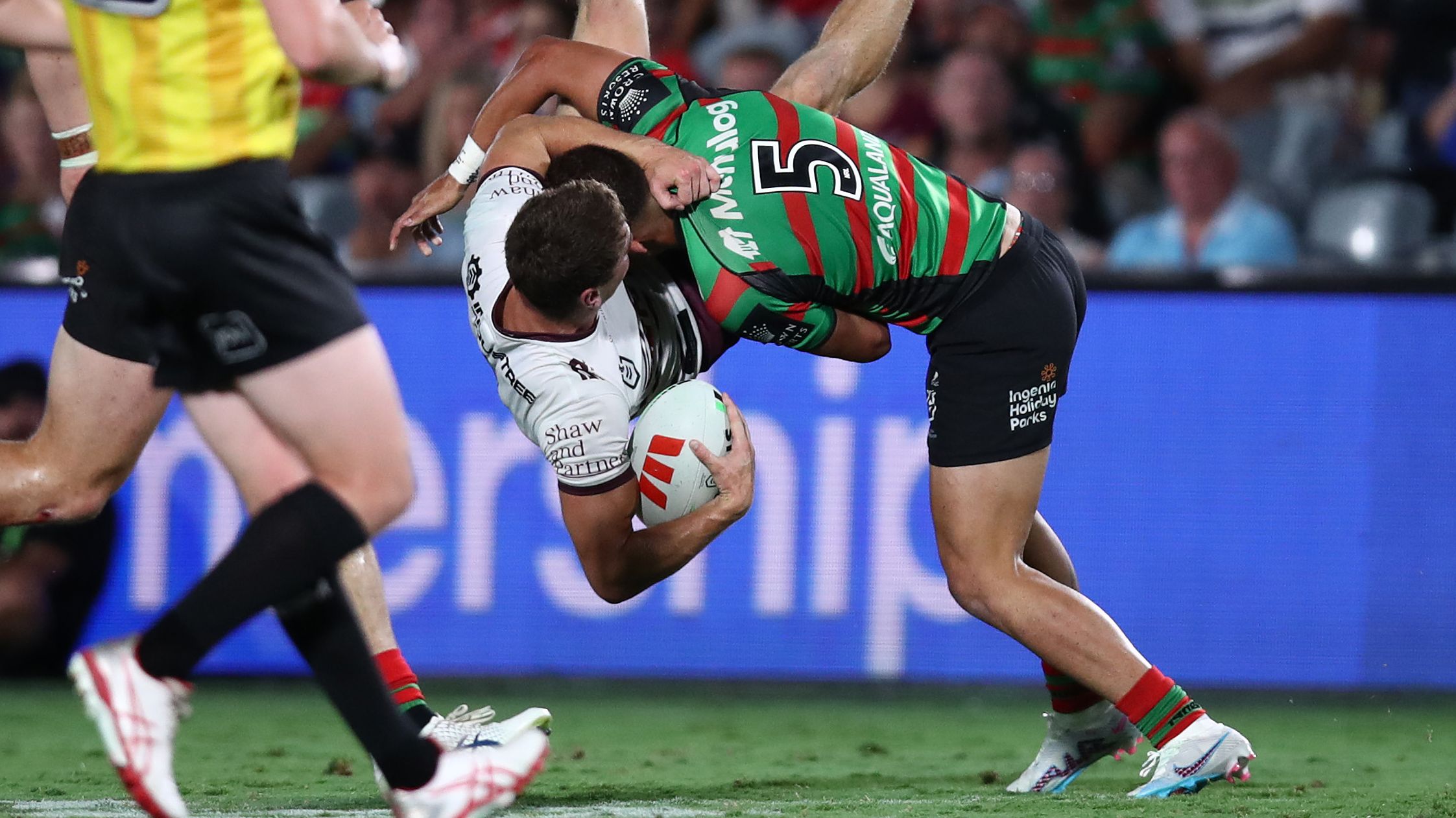 Fletcher Myers of the Sea Eagles is tackled by Leon Te Hau of the Rabbitohs during the South Sydney Rabbitohs and the Manly Sea Eagles at Industree Group Stadium on February 10, 2023 in Gosford, Australia. (Photo by Jason McCawley/Getty Images)