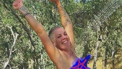 Pink posts nude photo taken by husband.