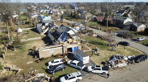 Recovery efforts continue on Tuesday, Dec. 14, 2021, for Bowling Green residents living in the Briarwood neighborhood following the tornado and severe storms that hit the city on Saturday, Dec. 11, 2021. (Grace Ramey/Bowling Green Daily News via AP)