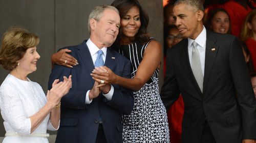 Michelle Obama, George W Bush share PDA in Washington DC