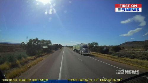The quick-thinking truckies veered off the road to avoid the crash. (9NEWS)