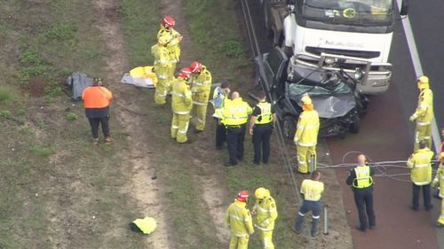 A Hyandai hatchback was completely crushed by the truck, to the point that it was almost split in half. Picture: 9NEWS