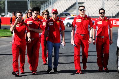 <p>Sebastian Vettel (GER) Ferrari walks the circuit with the team ahead of the Grand Prix. (AAP)</p>