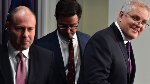 Treasurer Josh Frydenberg, Minister for Agriculture David Littleproud and Prime Minister Scott Morrison during a press conference announcing the new financial package for Australians hit by snap lockdowns.