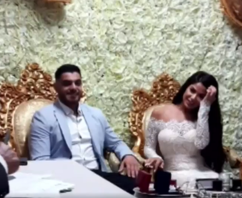 Mr Sayour can also be seen grinning during the ceremony. (9NEWS)