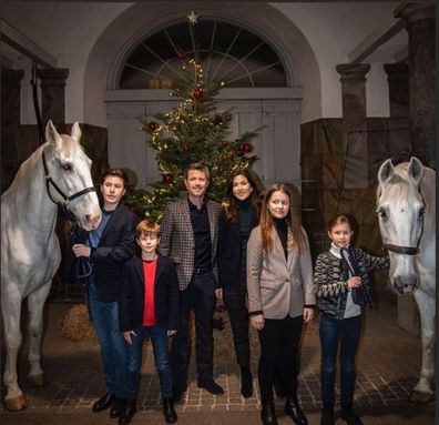 Princess Mary and her family decorate Christmas tree with their horses in palace stables