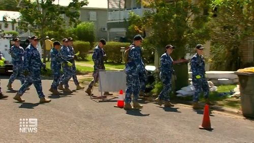 Army, Royal Australian Air Force (RAAF) and Navy workers have been assisting where needed in the Brisbane suburb of Rocklea today.