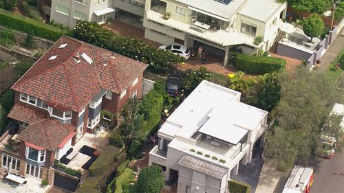 Mosman cliff hanging car 