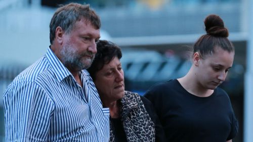 Phillip Hughes' dad Greg, mum Virginia and sister Megan leave the SCG. (AAP)