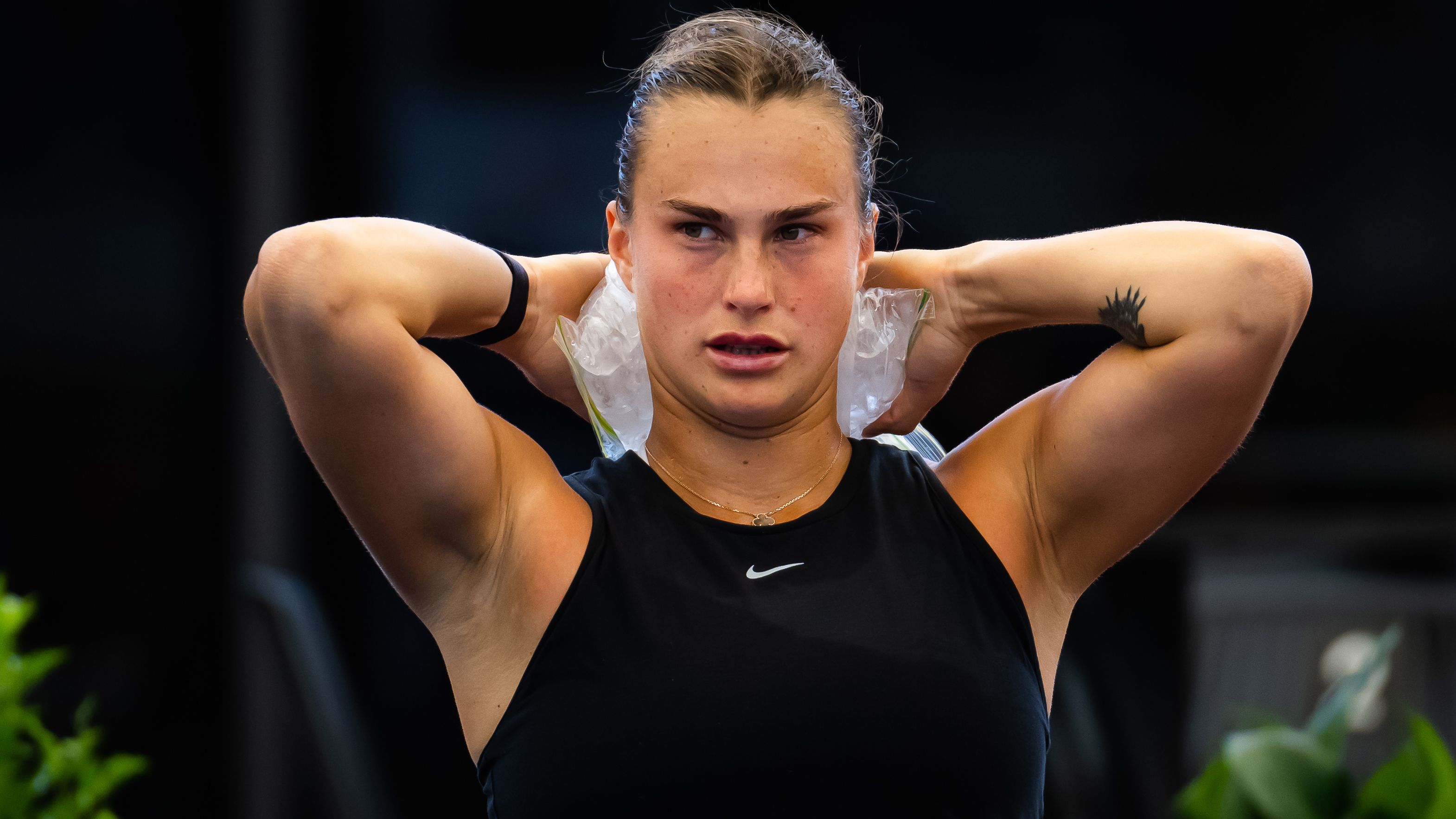 ADELAIDE, AUSTRALIA - JANUARY 07: Aryna Sabalenka of Belarus cools herself with ice packs during a change-over while playing against Irina-Camelia Begu of Romania in the semi-final on Day 7 of the 2023 Adelaide International at Memorial Drive on January 07, 2023 in Adelaide, Australia (Photo by Robert Prange/Getty Images)