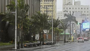 A main street is deserted as Typhoon Khanun approaches Naha city, Okinawa prefecture, southern Japan, Saturday, August 5, 2023.