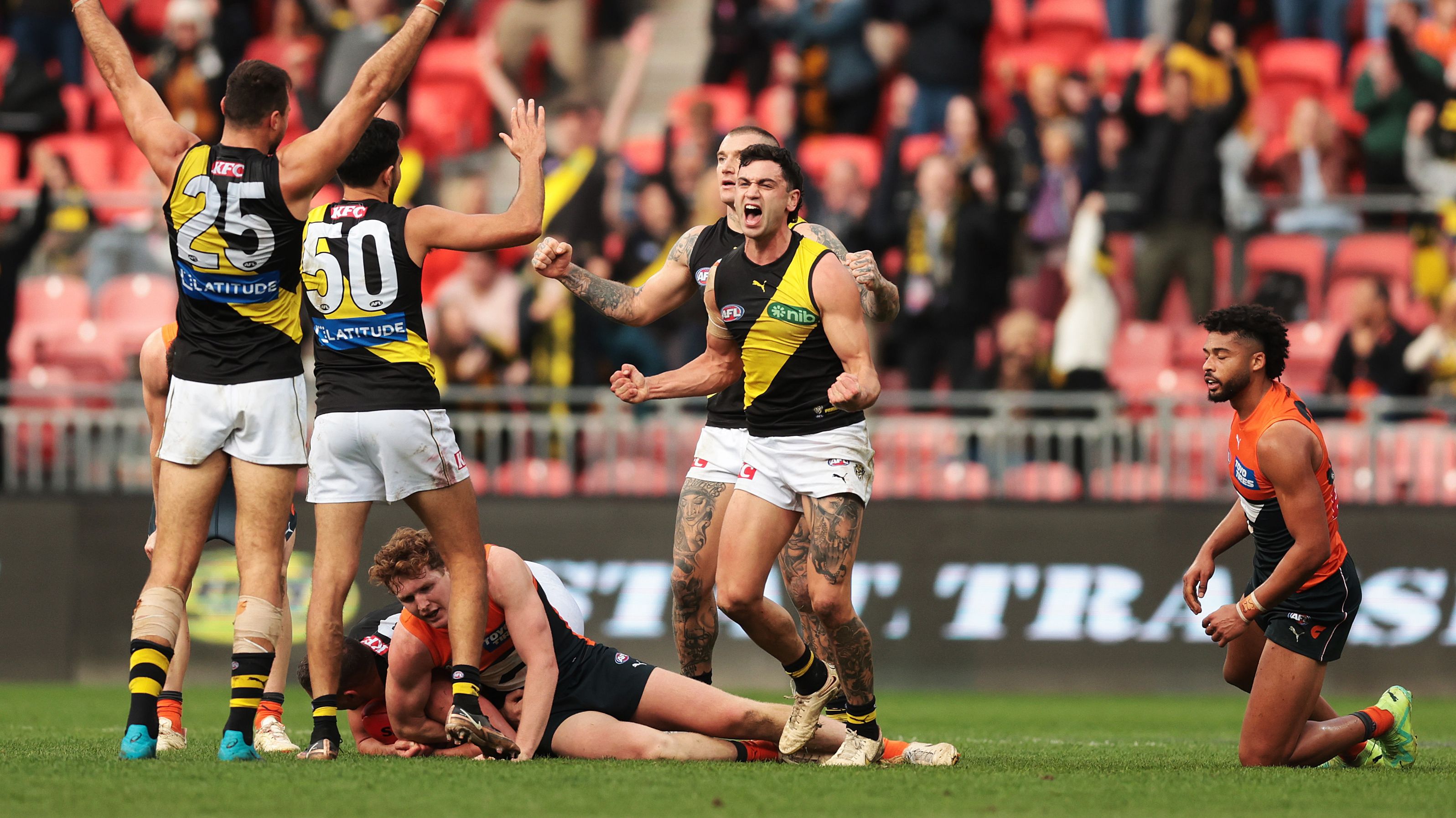 SYDNEY, AUSTRALIA - JUNE 04:  Tim Taranto of the Tigers  celebrates victory on the final siren during the round 12 AFL match between Greater Western Sydney Giants and Richmond Tigers at GIANTS Stadium, on June 04, 2023, in Sydney, Australia. (Photo by Mark Metcalfe/AFL Photos/via Getty Images )