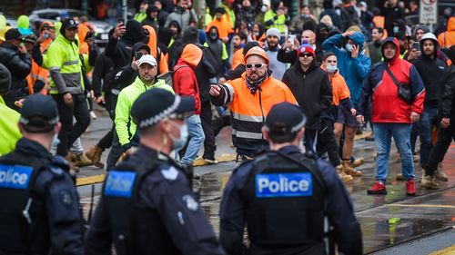 The Age, News, 20/09/2021, photo by Justin McManus. Construction workers protest outside the office of the CFMEU against mandatory vaccines in the construction industry.