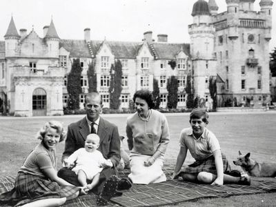 The royal family play with a baby Prince Andrew, 1960