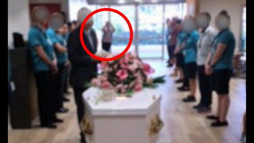 A senior nurse was seen photographing Lottie's coffin at her funeral.