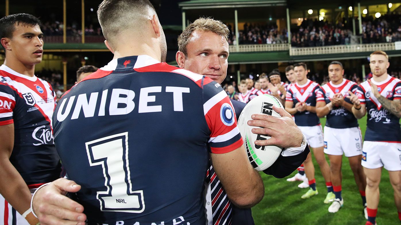  Retired Roosters player Jake Friend embraces Roosters captain James Tedesco after walking through a guard of honour prior to the round 11 NRL match between the Sydney Roosters and the Brisbane Broncos at Sydney Cricket Ground, on May 22, 2021, in Sydney, Australia. (Photo by Matt King/Getty Images)
