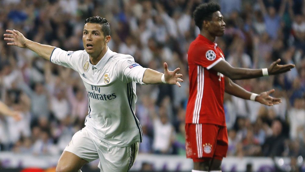 Cristiano Ronaldo hat-trick gets Real Madrid through in European Champions League