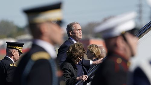 Former President George W Bush, the eldest of the Bush sons, and his family boarded a plane that usually serves as Air Forec One for the cross-country trip.