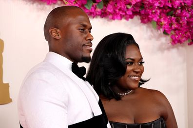 HOLLYWOOD, CALIFORNIA - MARCH 10: Danielle Brooks (R) and guest Dennis Gelin attend the 96th Annual Academy Awards on March 10, 2024 in Hollywood, California. (Photo by Mike Coppola/Getty Images)